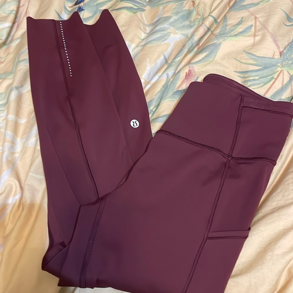 Lululemon fast and free tights - cranberry color. Size 6. Like new